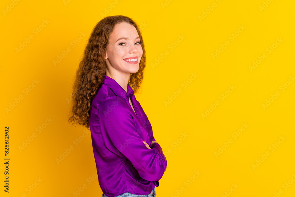 Photo portrait of pretty young girl crossed hands confident profile wear trendy violet outfit isolated on yellow color background Photo portrait of pretty young girl crossed hands confident profile wear trendy violet outfit isolated on yellow color background