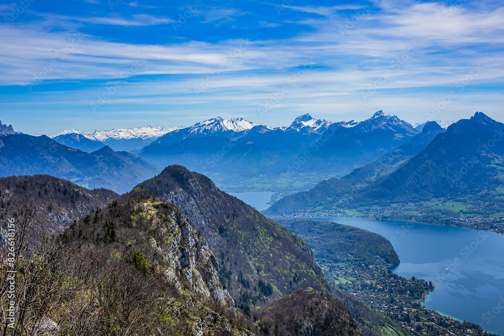 Fototapeta premium Wonderful views on a walk above the picturesque Lake Annecy. Route along the ridge from Mont Veyrier to Mont Baron from Annecy. Annecy, Haute-Savoie, France.