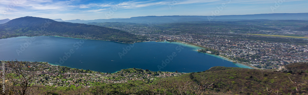 Fototapeta premium Wonderful views on a walk above the picturesque Lake Annecy. Route along the ridge from Mont Veyrier to Mont Baron from Annecy. Annecy, Haute-Savoie, France.