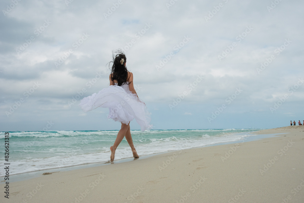 woman in a white dress runs along the beach, runaway bride, brunette in a white dress, girl running woman in a white dress runs along the beach, runaway bride, brunette in a white dress, girl running
