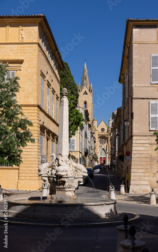 Aix en Provence, typical side street with fountain and church