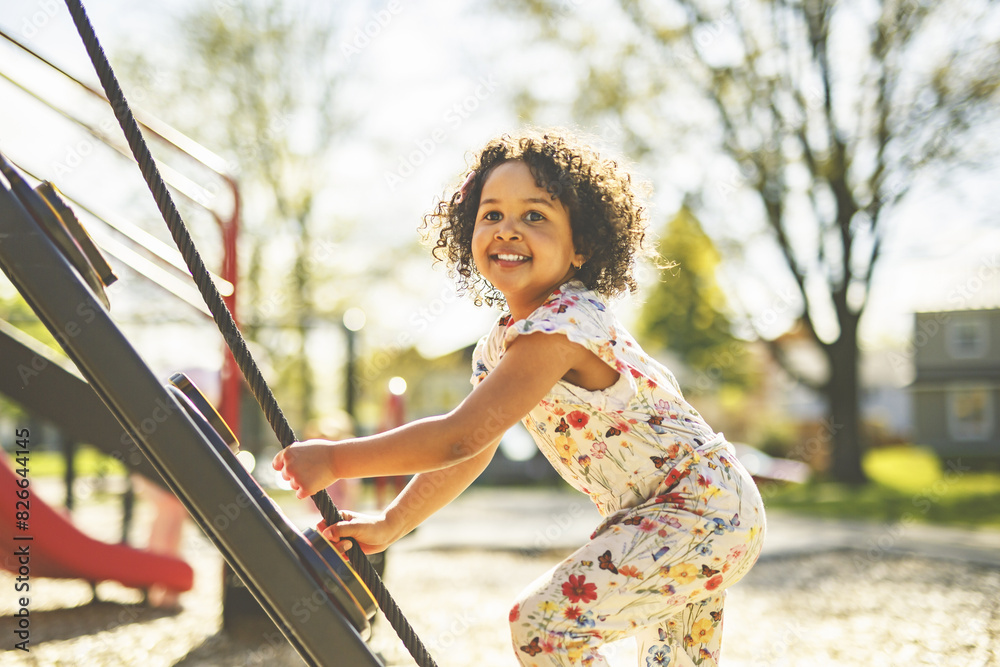 Naklejka premium Happy kid on playground on summer season