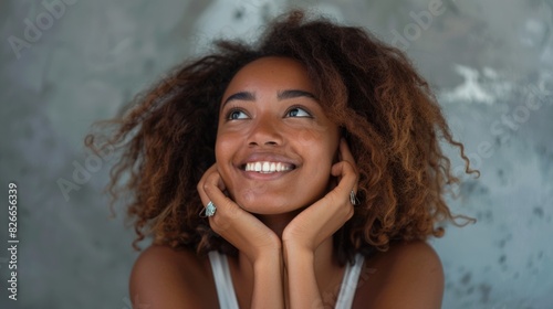 Smiling Woman with Curly Hair photo