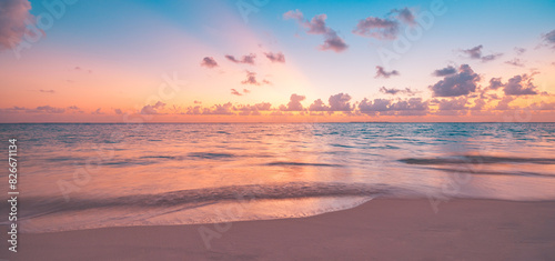 Peaceful closeup sea sand sky beach. Beautiful tranquil nature landscape. Inspire calm tropical beach seascape wave horizon. Colorful panoramic sunset relaxing summer pattern. Vacation travel tourism