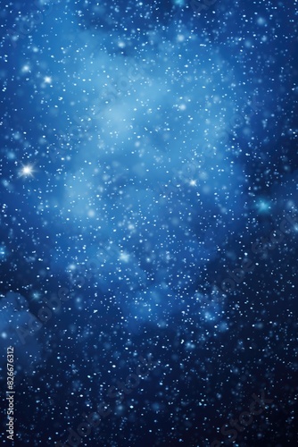 A blue sky with a lot of stars and snowflakes. The sky is very clear and the stars are shining brightly