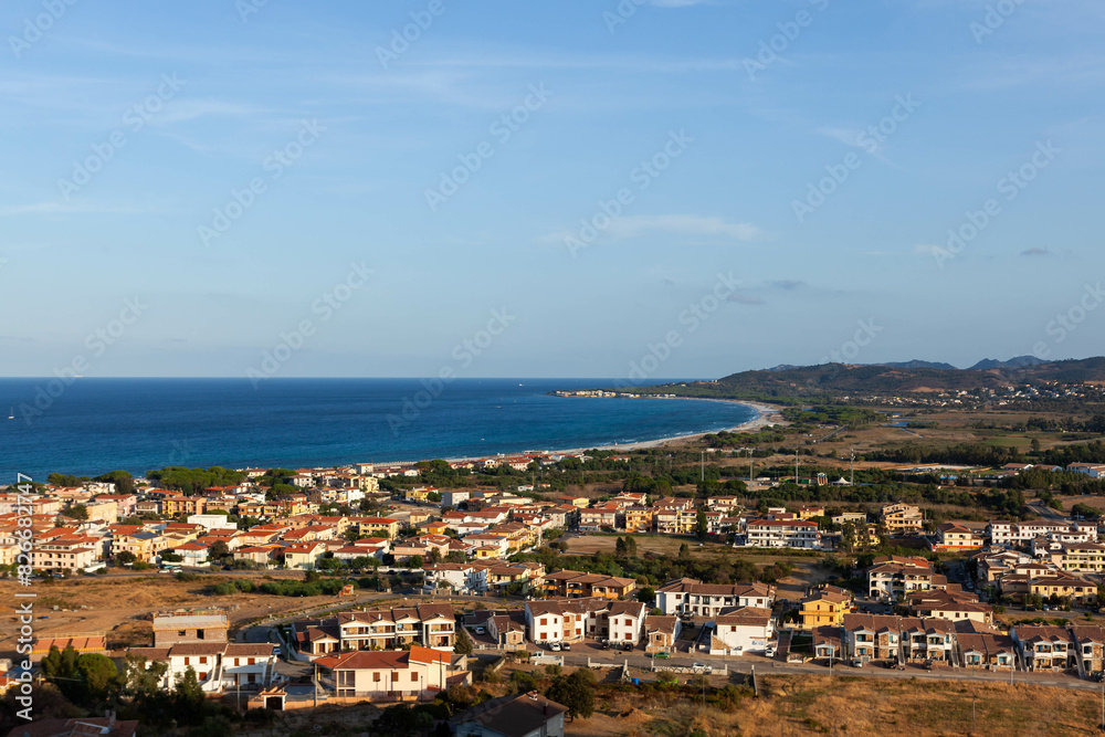 La Caletta, Sardinia: Coastal town, Mediterranean Sea, sandy beach, summer vacation. La Caletta, Sardinia: Coastal town, Mediterranean Sea, sandy beach, summer vacation.