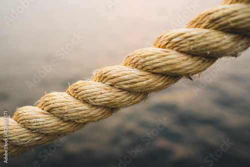 Extreme closeup of rope over water