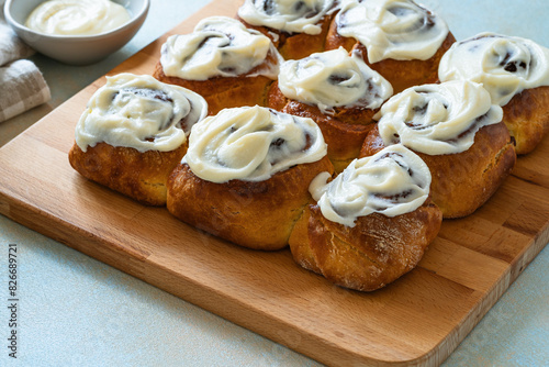 Cinnamon buns, homemade traditional sweet rolls with cream cheese icing
