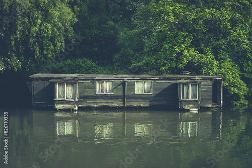 Rundown Houseboat On A River