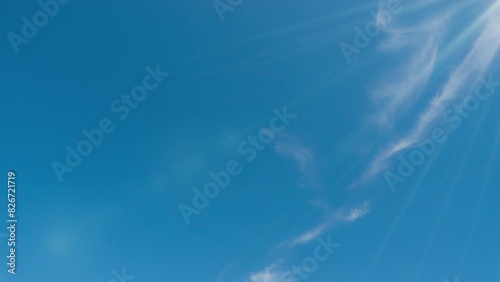 White Clouds Floating Across the Blue Sky Covered by Parachutes: Entertainment on Sea Holidays and Flying Sports. Loop photo
