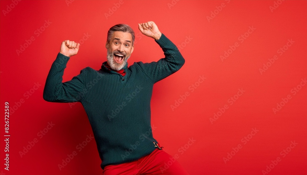 More happy and excited man on red background More happy and excited man on red background