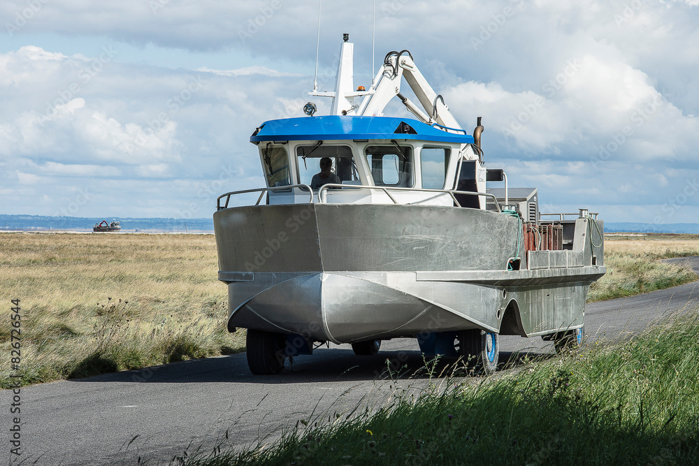 amphibious mussel boat coming back from the sea at the coast of Brittany amphibious mussel boat coming back from the sea at the coast of Brittany