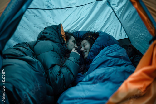 Mates nestled in sleeping bags inside a tent, whispering and giggling long into the night. Concept of intimacy and friendship. Generative Ai. photo