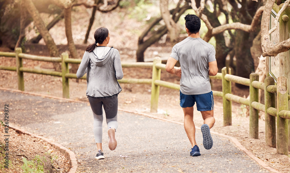 Obraz premium Running, back and fitness of couple, outdoor and active for performance, road and exercise for body. Street, athlete and people together, healthy and training with workout, action and path in park