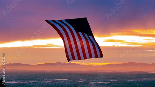 United State Flag flies in a canyon overlooking Ogden Utah photo