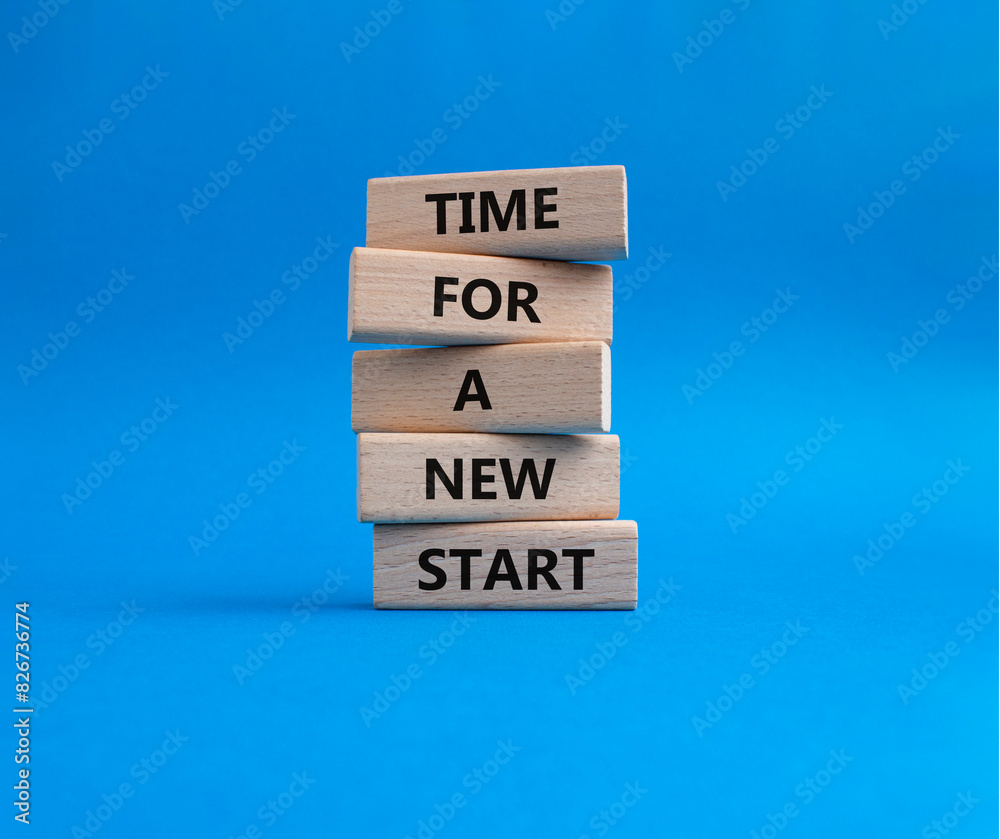 Time for a new start symbol. Wooden blocks with words Time for a new start. Beautiful blue background. Business and Time for a new start concept. Copy space. Time for a new start symbol. Wooden blocks with words Time for a new start. Beautiful blue background. Business and Time for a new start concept. Copy space.