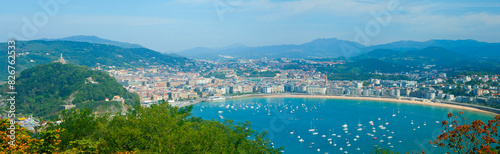 panoramic view of the Basque city of San Sebastian from Mount Igueldo on a sunny summer day photo