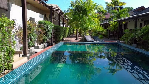 Wallpaper Mural beach resort pool surrounded by lush greenery Marvelous aerial view flight drone Torontodigital.ca