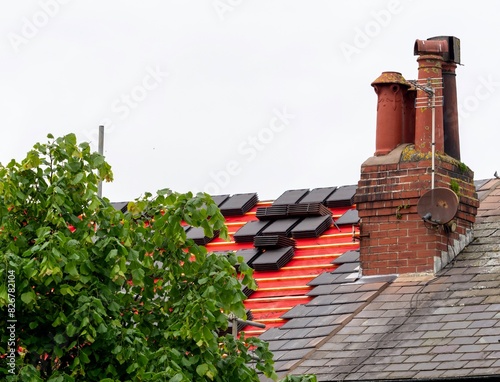 Фотография New Roof Tiles Being Replaced