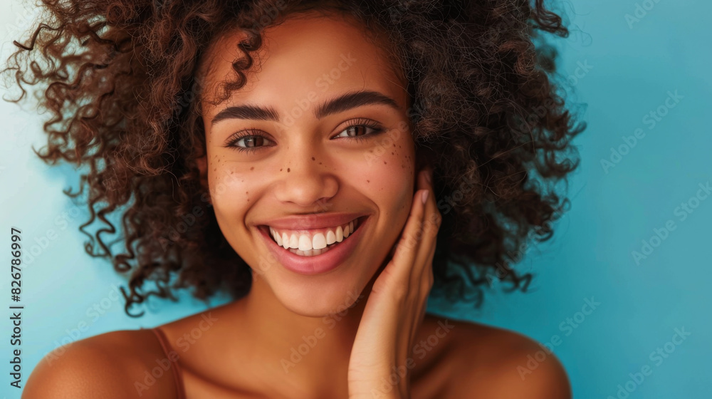 Portrait of a young woman with braces on her teeth. Smiling woman posing while looking at the camera. Portrait of a young woman with braces on her teeth. Smiling woman posing while looking at the camera.