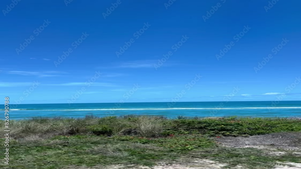 Driving along Highway A1A the beach near Flagler Beach, Florida. Driving along Highway A1A the beach near Flagler Beach, Florida.