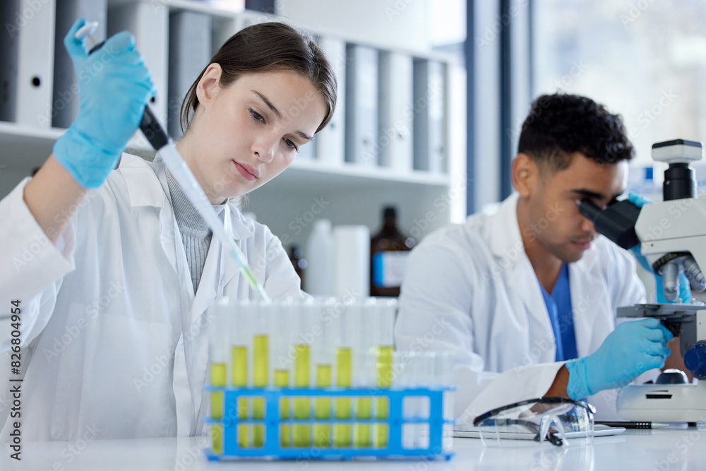 Science, teamwork and people with test tube and microscope for research, medical study and discovery. Healthcare, pharmaceutical and scientist man and woman for vaccine, medicine and biology sample Science, teamwork and people with test tube and microscope for research, medical study and discovery. Healthcare, pharmaceutical and scientist man and woman for vaccine, medicine and biology sample
