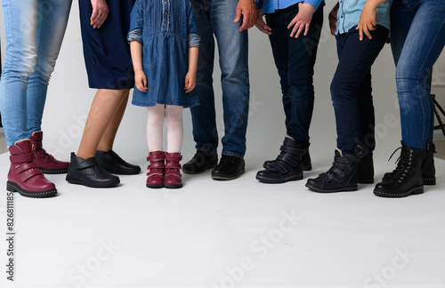Children standing in orthopedic winter shoes photo
