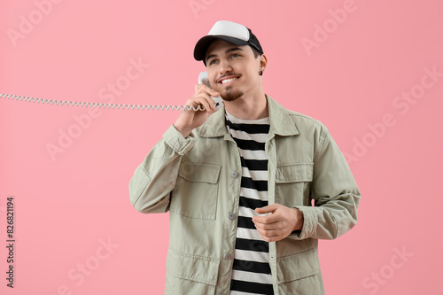 Happy young man talking by ...