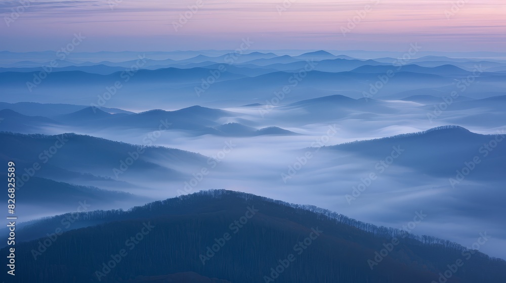 The image shows a beautiful mountain landscape with a sea of fog in the valley