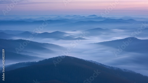 The image shows a beautiful mountain landscape with a sea of fog in the valley