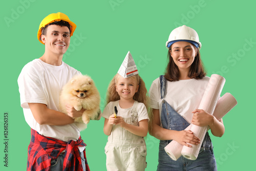 Happy family with repair ma...