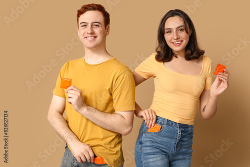 Young couple with condoms o...