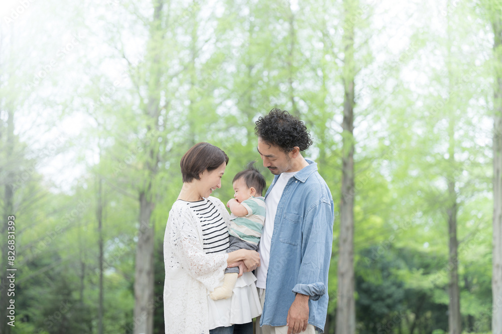 Middle couple taking a walk in fresh greenery Image of happiness and well-being gazing at each other Middle couple taking a walk in fresh greenery Image of happiness and well-being gazing at each other
