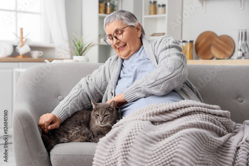 Senior woman with plaid and...