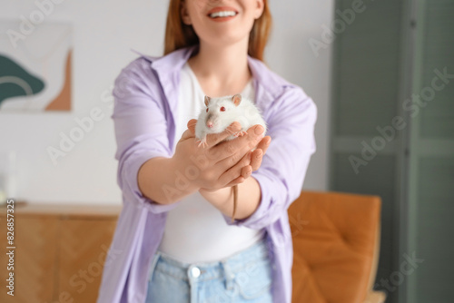 Young woman with cute white...