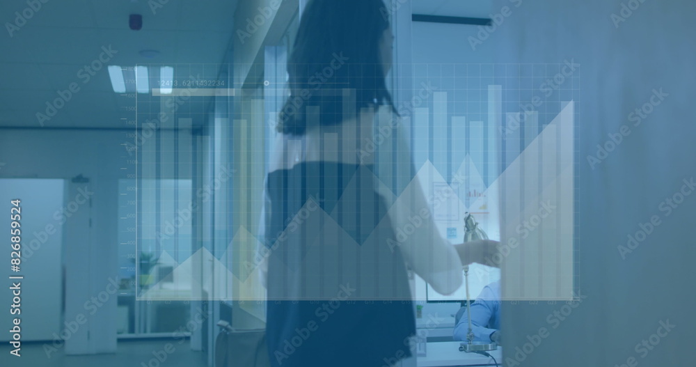 Image of graphs and loading bar over biracial woman walking in office and opening door Image of graphs and loading bar over biracial woman walking in office and opening door