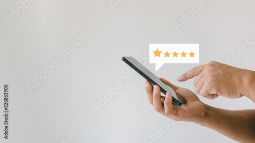 Customer review satisfaction feedback survey concept. User give rating to service experience on online application. Customer can evaluate quality of service leading to reputation ranking of business.