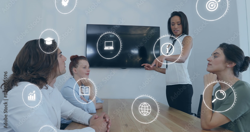 © vectorfusionart - Image of icons and data processing over diverse business people in office