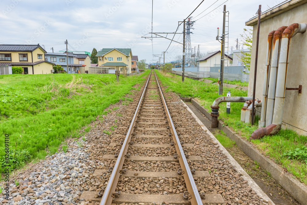 Long straight rail track, single-track railway, Echigo Tokimeki Railway, Japan Long straight rail track, single-track railway, Echigo Tokimeki Railway, Japan