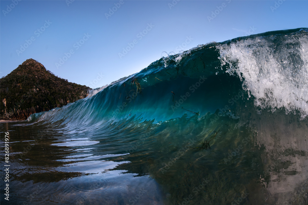 Naklejka premium Breaking waves at sunset, Australia