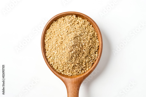 Dried Angelica Root in Wooden Spoon photo