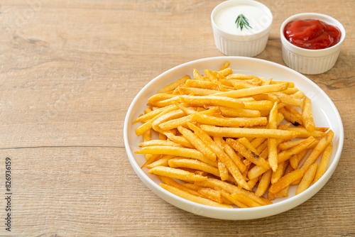 French fries with sour cream and ketchup