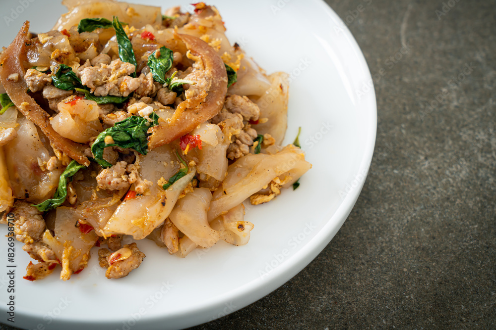 Stir-fried noodle with minced chicken and basil Stir-fried noodle with minced chicken and basil