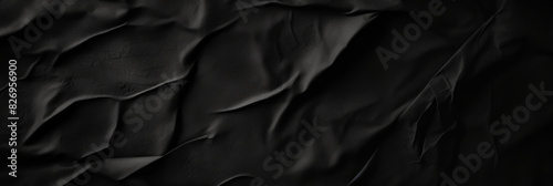Black paper poster texture background  Weathered black paper texture  black friday banner.Crumpled black paper with wrinkles and rubbed corners