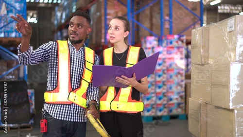 warehouse workers discussing or talking together about the their works.