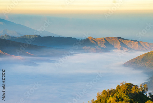 Sunrise over mountain range, Tengger Semeru National Park, Mount Bromo, in East Java, Indonesia photo