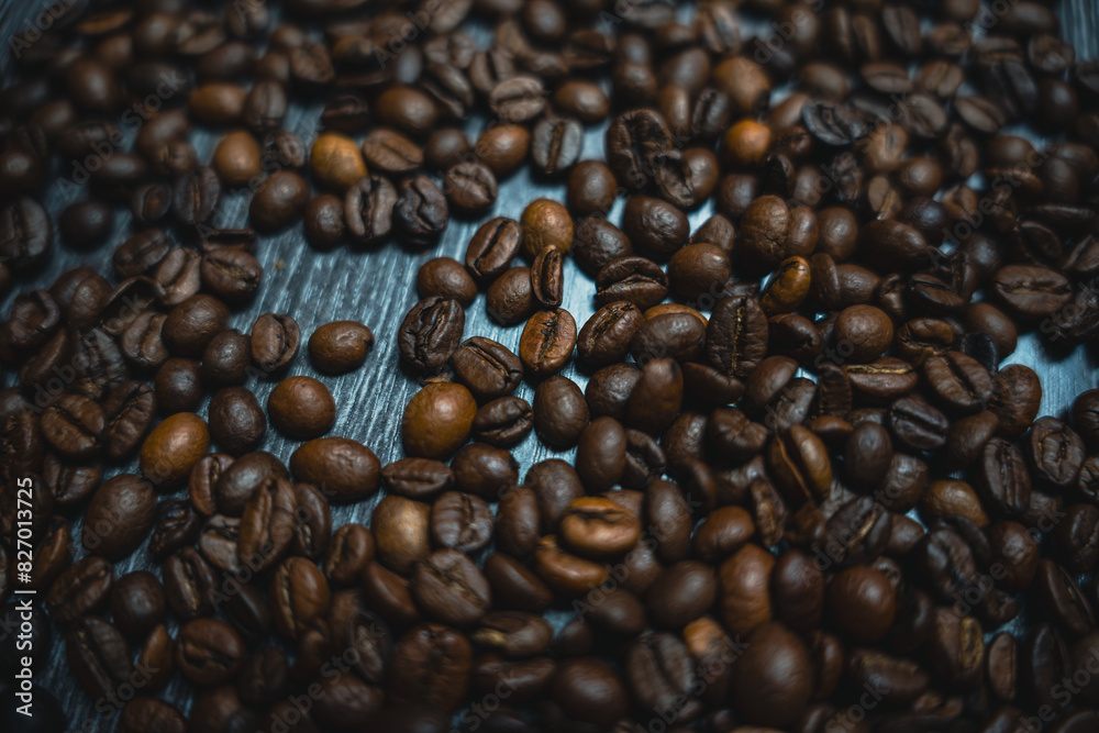 Fototapeta premium Colorful background with coffee beans in close-up
