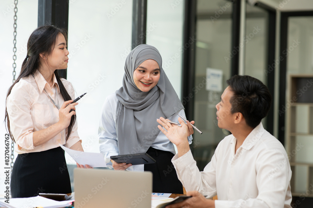 Asia business meeting consultations of business people in the company's meeting room. Asia business meeting consultations of business people in the company's meeting room.