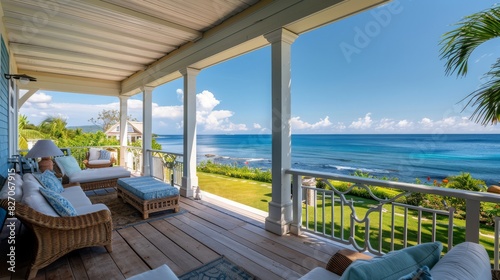 A coastal bungalow with a wrap-around porch offering stunning ocean vistas