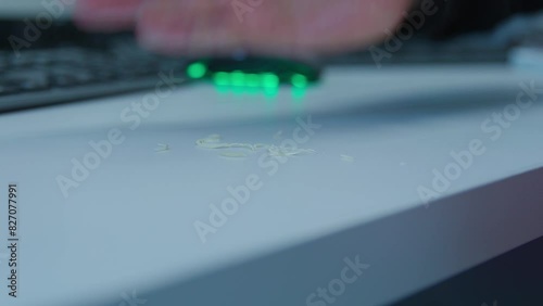 Wallpaper Mural The person removes the trimmed nails from the table after he has finished cutting them Torontodigital.ca